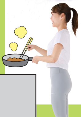 正しい姿勢で料理をする女性