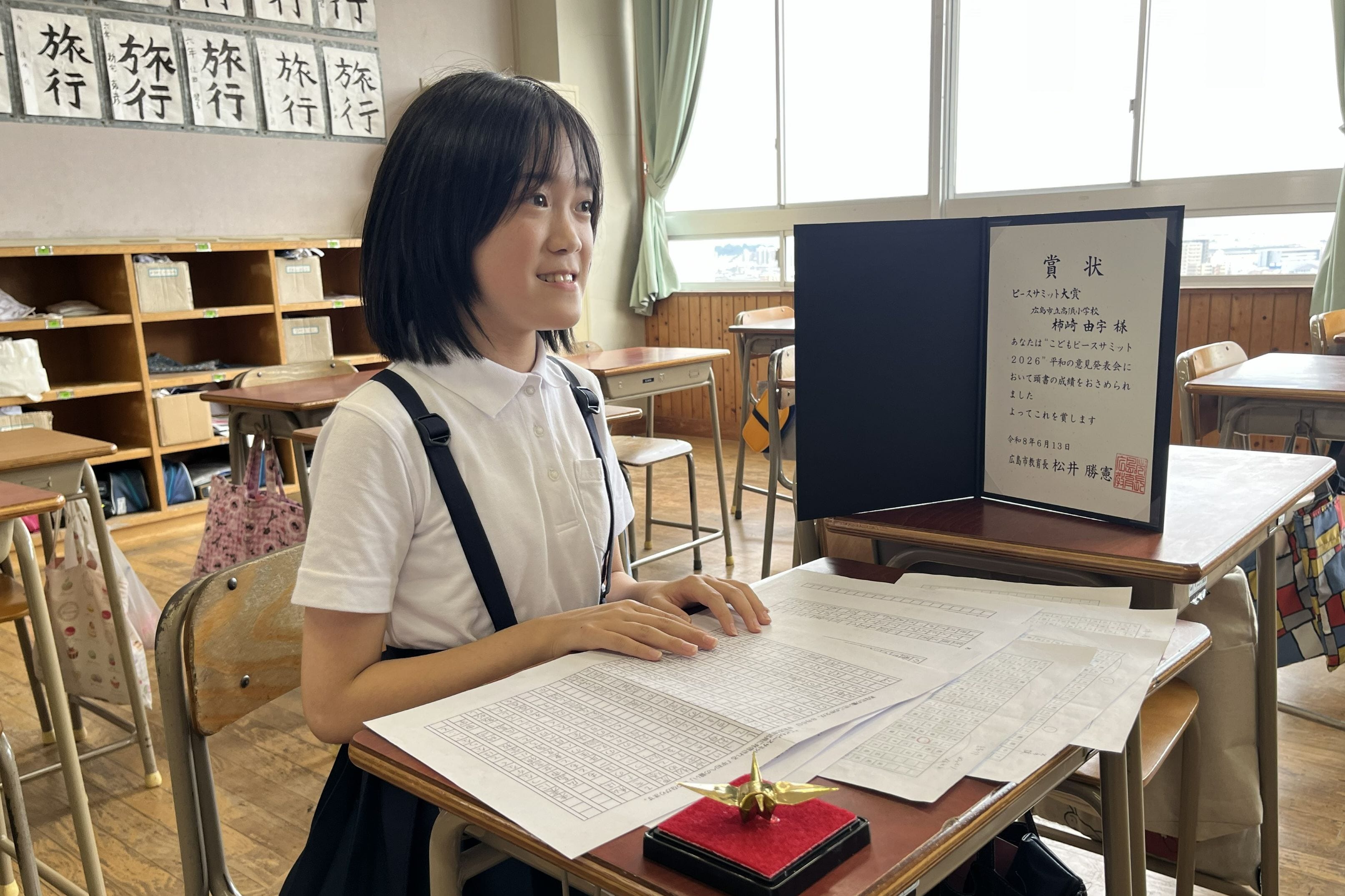 平和への思いを語る柿崎さん
